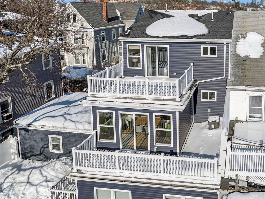 25 Cranston Street, Unit 2 Boston, MA 02130 - Photo 40 of 41 front view of a house with a porch
