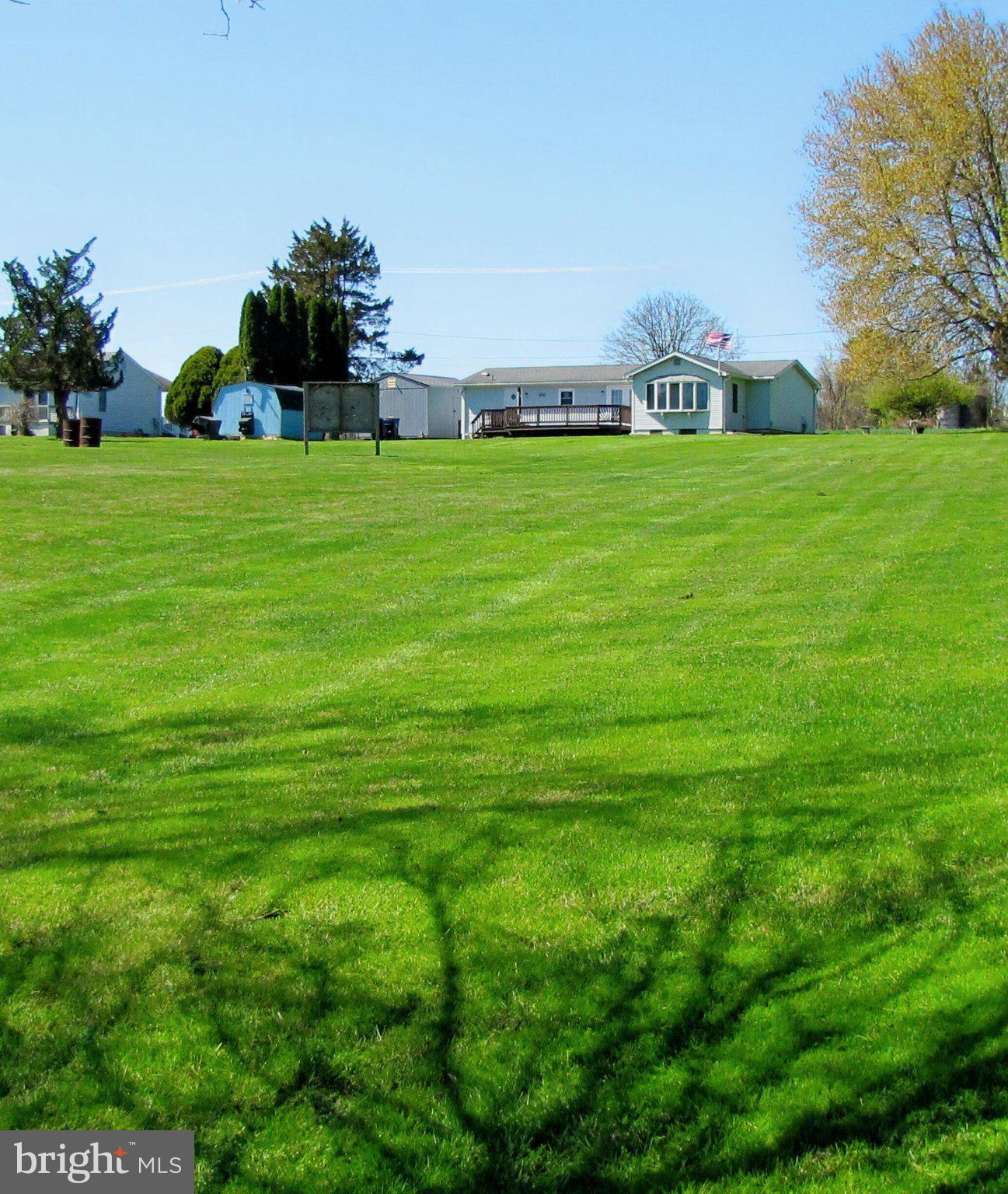 1729 Colora Road Colora, MD 21917 - Photo 6 of 21 Spacious lawn with charming home backdrop.