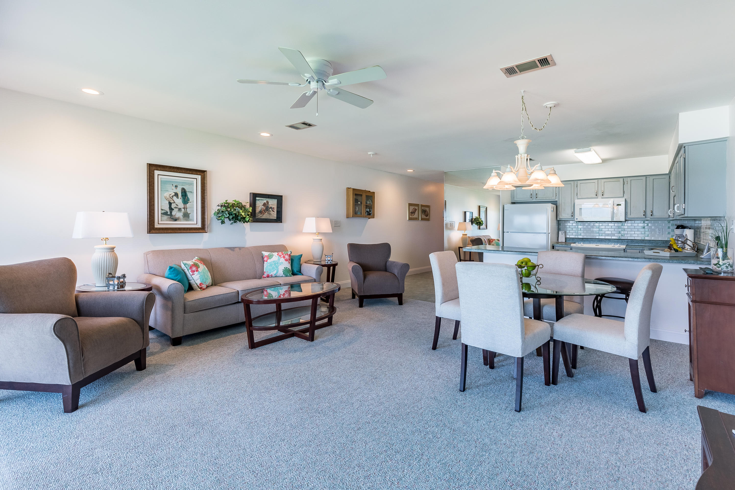 214 Blue Mountain Road, Unit 14 Santa Rosa Beach, FL 32459 - Photo 8 of 24 a living room with furniture and a chandelier