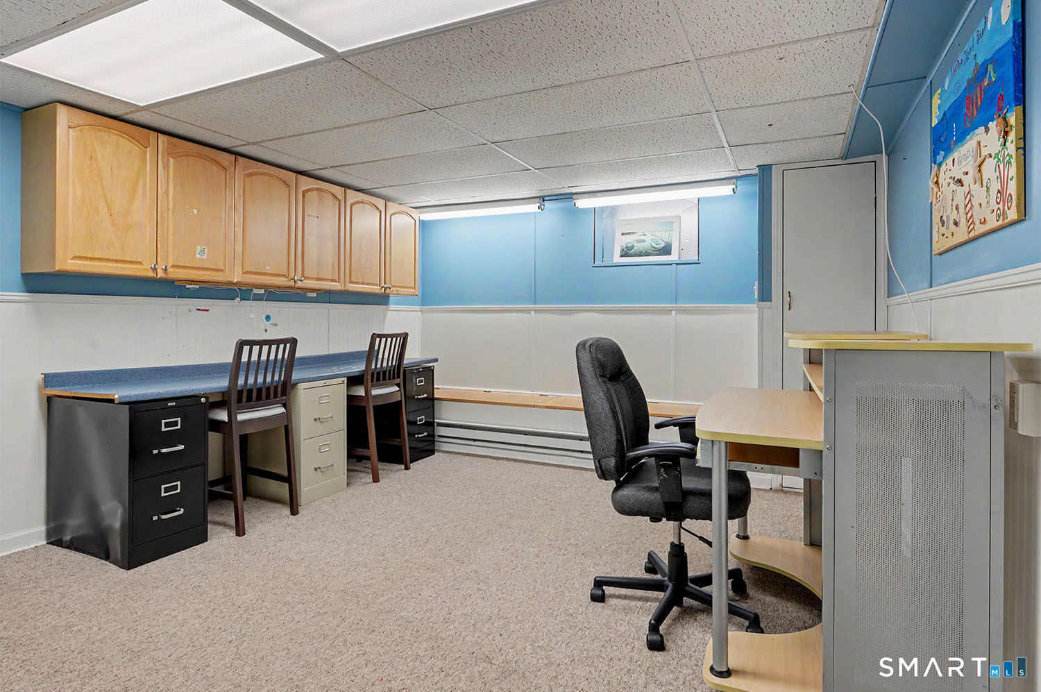 365 Adley Road Fairfield, CT 06825 - Photo 25 of 39 Finished Basement space (left side for office/workstation/school)
