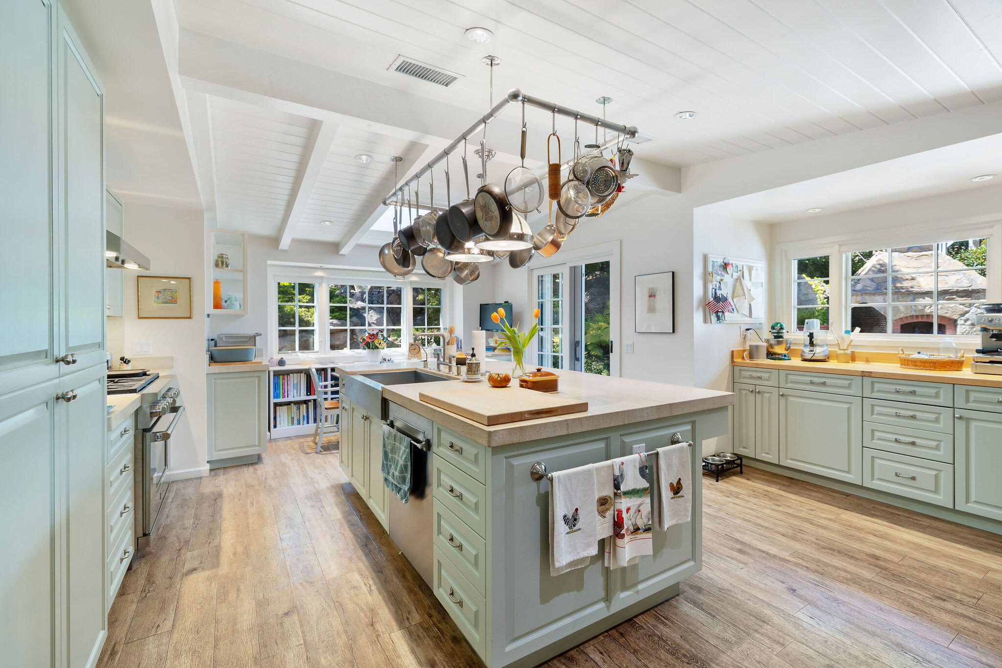 2868 East Valley Road Montecito, CA 93108 - Photo 16 of 34 a kitchen with stainless steel appliances granite countertop a stove and cabinets