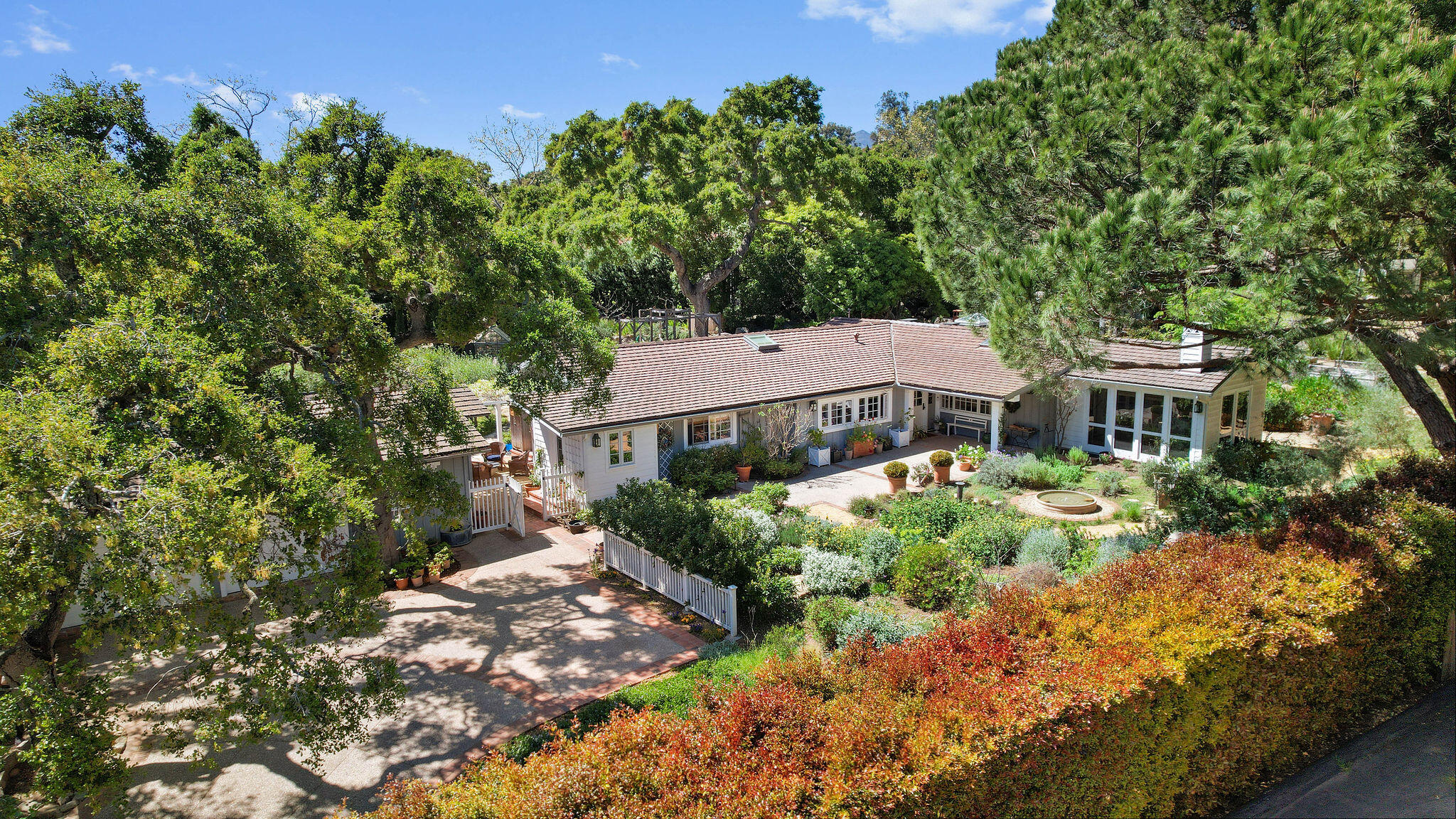 2868 East Valley Road Montecito, CA 93108 - Photo 2 of 34 front view of a house with a yard