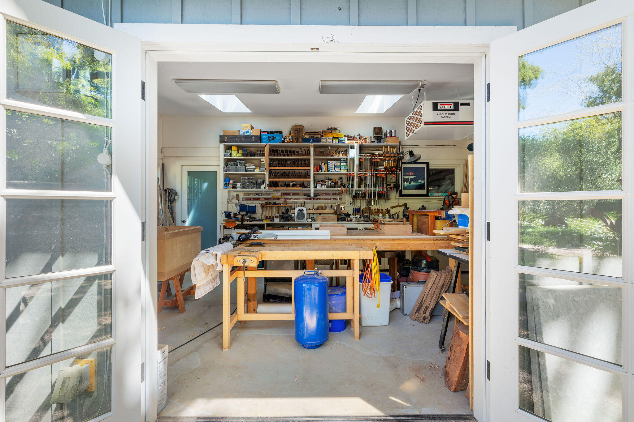 2868 East Valley Road Montecito, CA 93108 - Photo 24 of 34 a kitchen with stainless steel appliances granite countertop a stove and a refrigerator