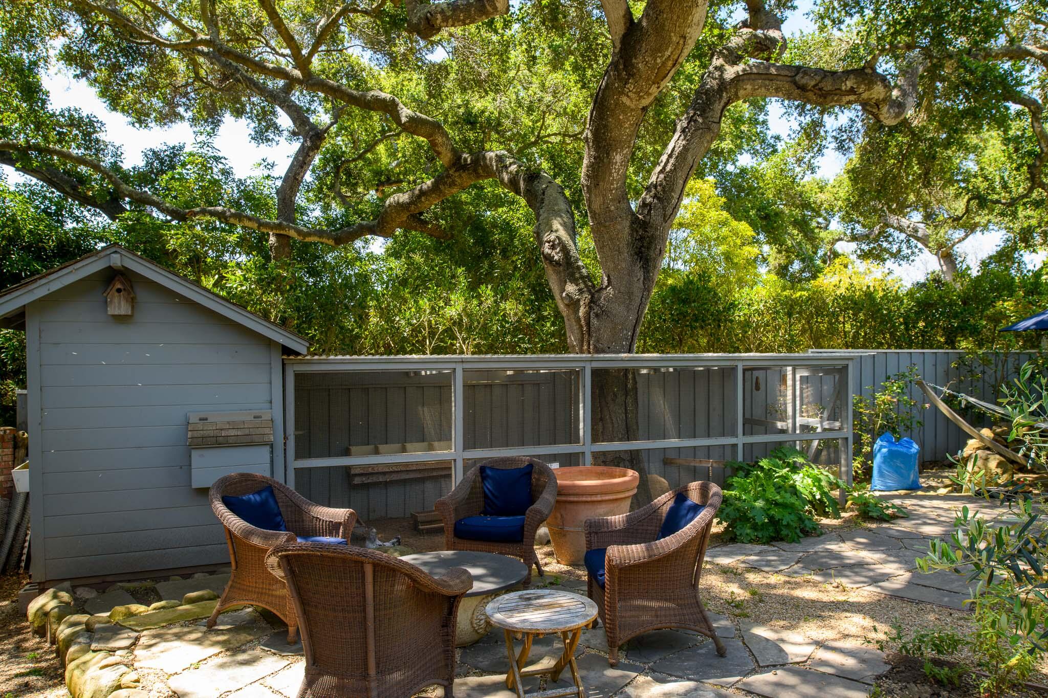 2868 East Valley Road Montecito, CA 93108 - Photo 27 of 34 a view of a chair and tables in the patio
