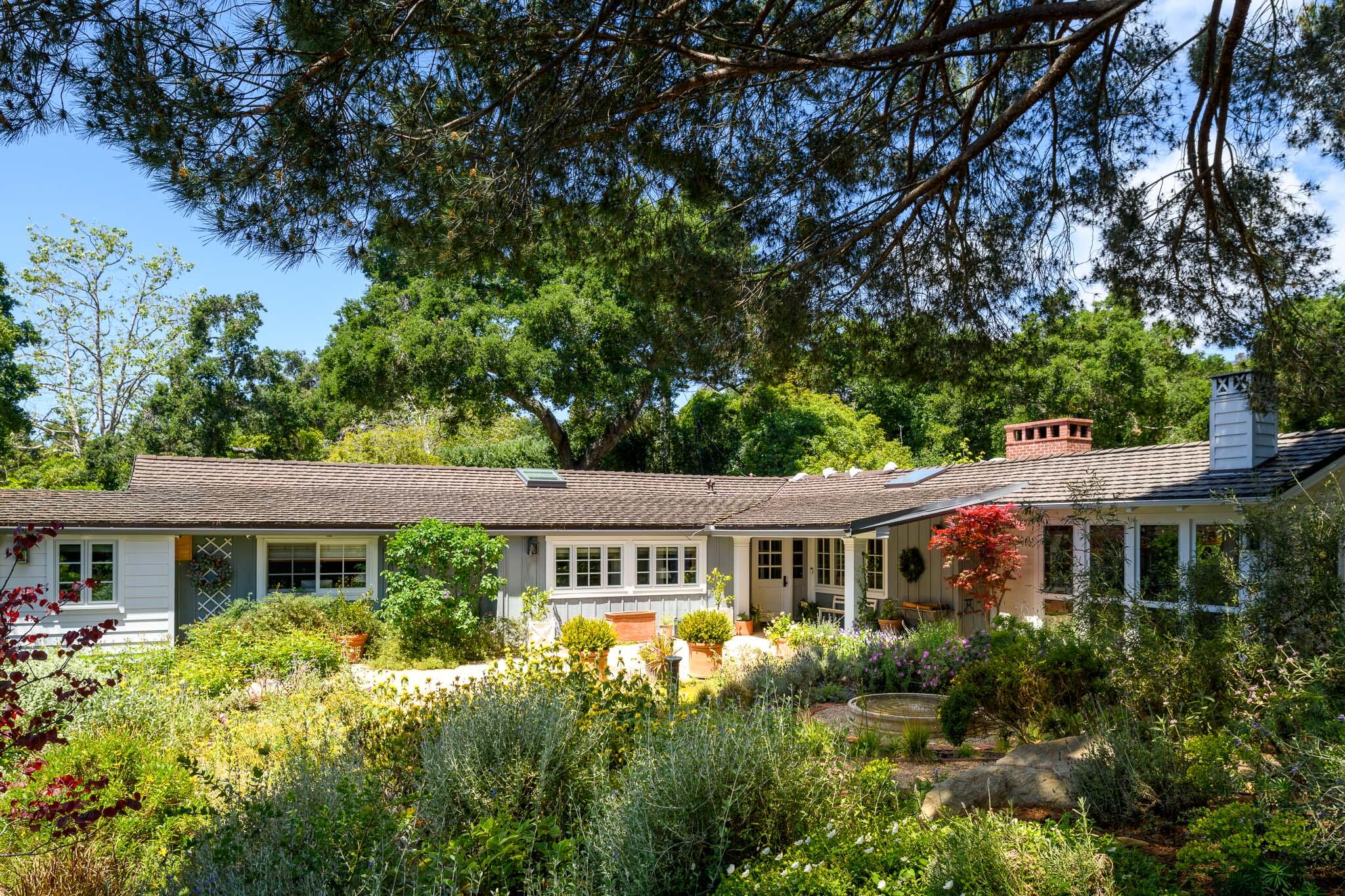 2868 East Valley Road Montecito, CA 93108 - Photo 5 of 34 a front view of house with a garden