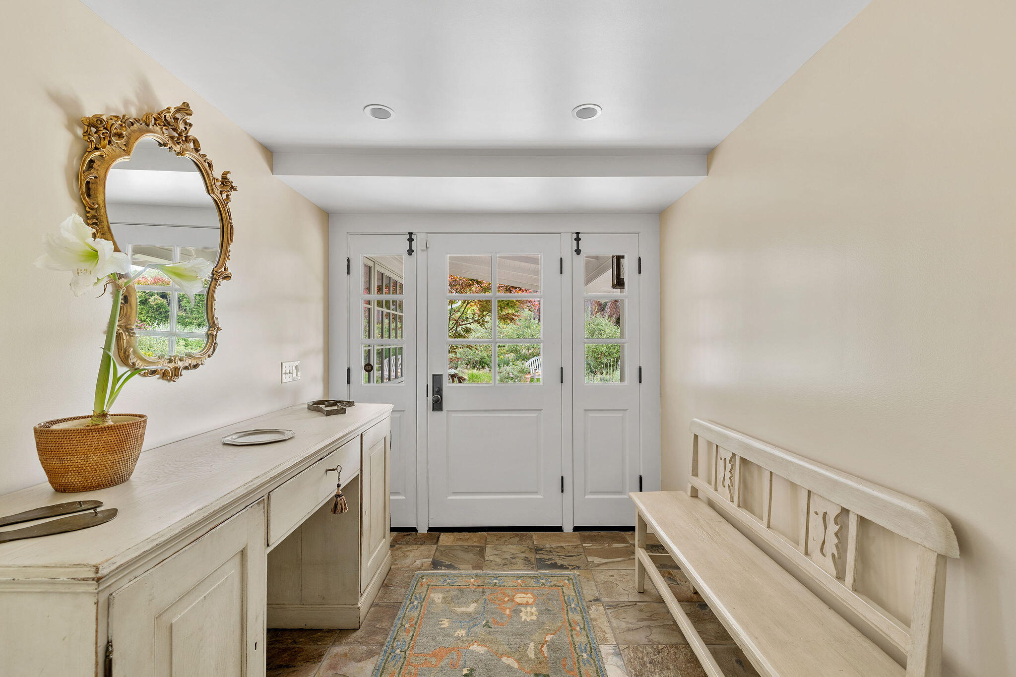 2868 East Valley Road Montecito, CA 93108 - Photo 9 of 34 a bathroom with a sink and a mirror