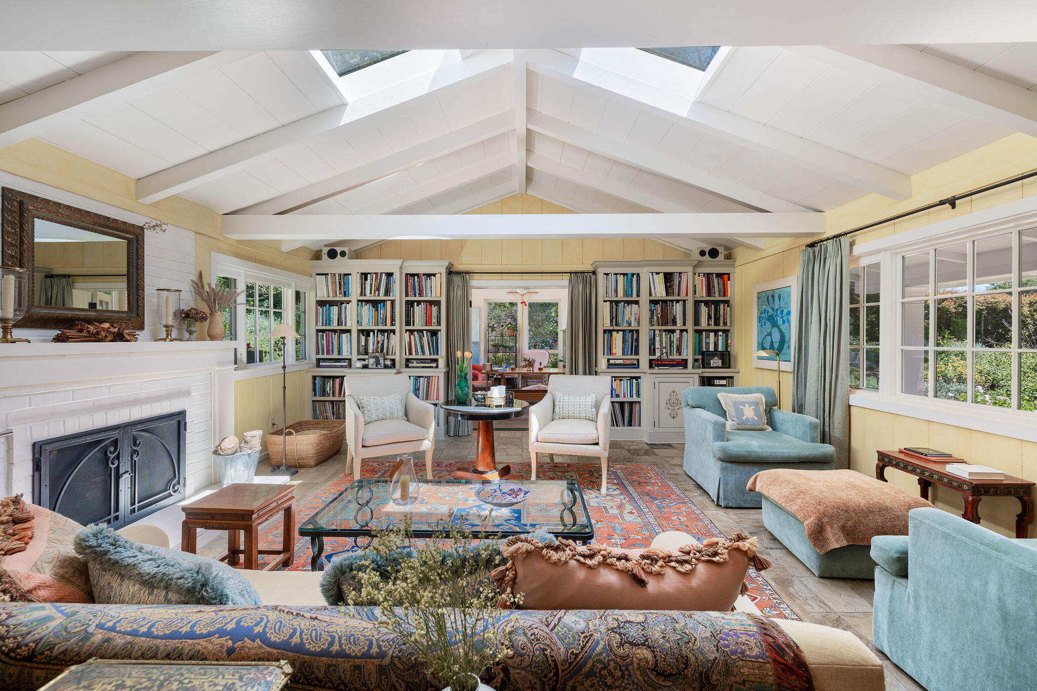 2868 East Valley Road Montecito, CA 93108 - Photo 10 of 34 a living room with furniture fireplace and a flat screen tv