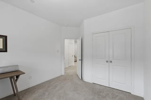 a view of room with walk in closet