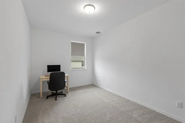 a view of workspace with a window