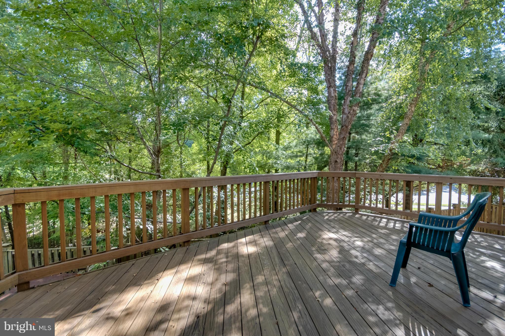 1279 Weatherstone Court Reston, VA 20194 - Photo 11 of 28 a view of balcony with wooden floor and outdoor seating