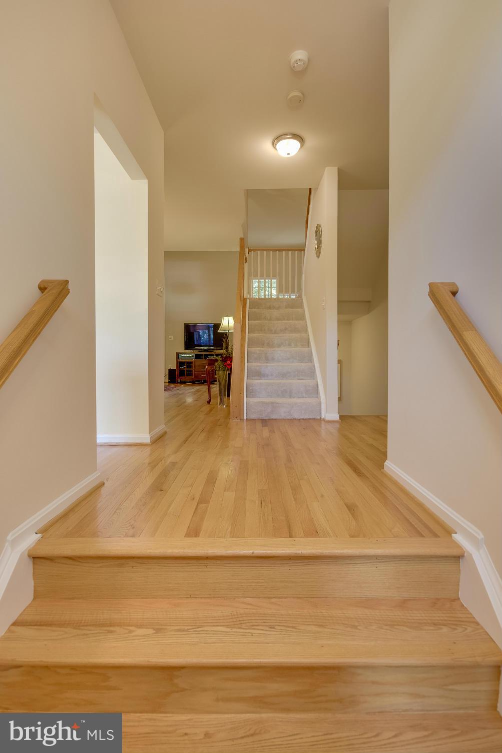 1279 Weatherstone Court Reston, VA 20194 - Photo 13 of 28 a view of a room with wooden floor