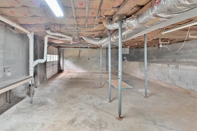 a view of a room with wooden racks