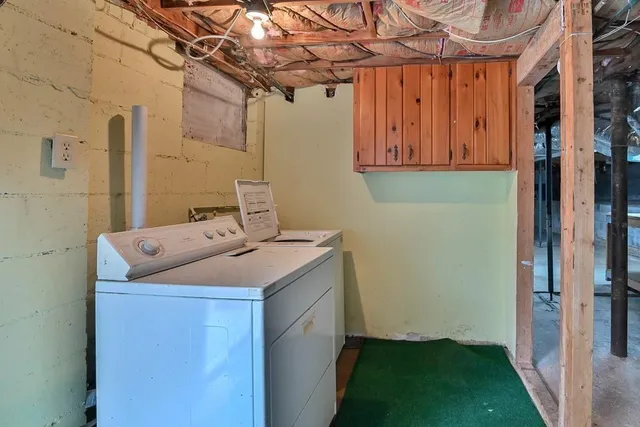 a bathroom with a sink and vanity