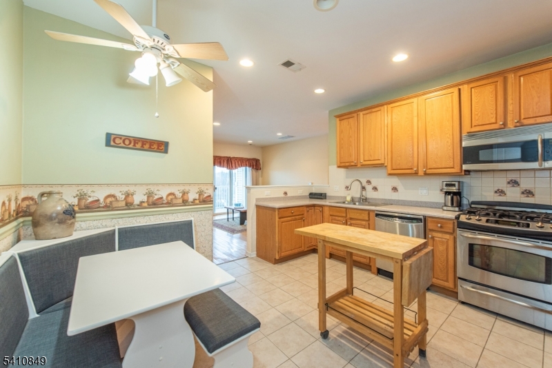 10323 Warren's Way Wanaque, NJ 07465 - Photo 12 of 30 a kitchen with a sink cabinets and window