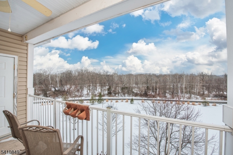 10323 Warren's Way Wanaque, NJ 07465 - Photo 22 of 30 a view of a balcony with wooden fence