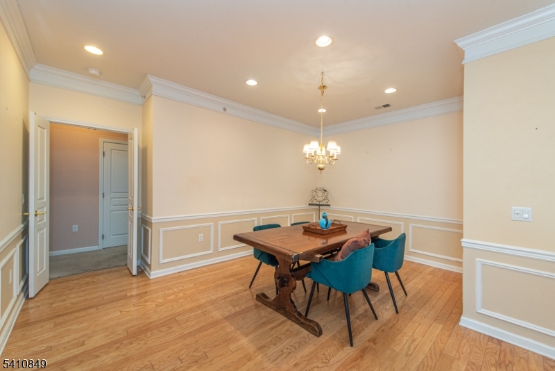 10323 Warren's Way Wanaque, NJ 07465 - Photo 5 of 30 a view of a dining room with furniture and wooden floor