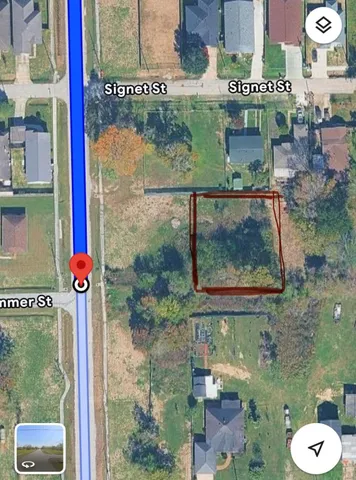 a sign that is on the side of the building