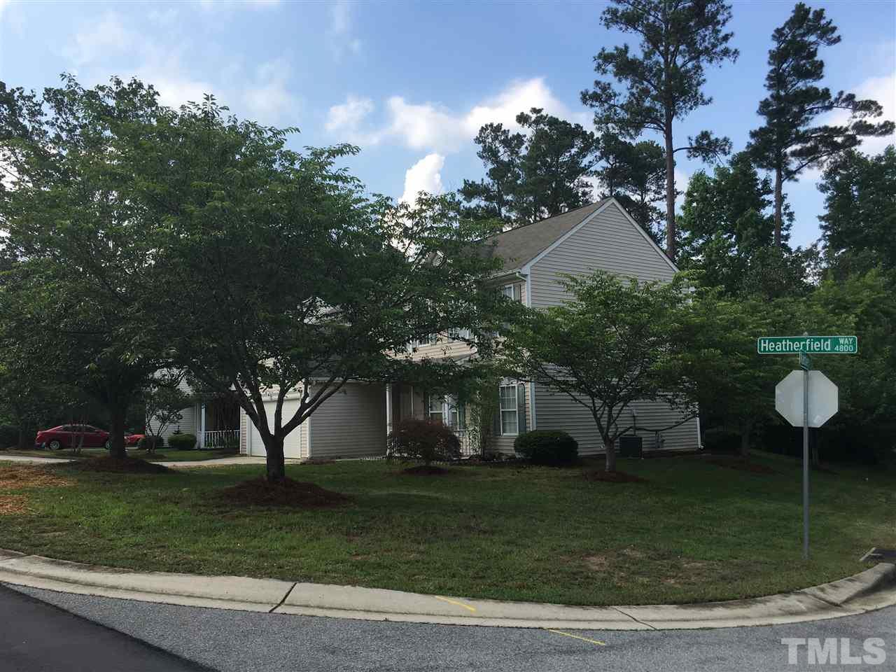 4841 Heatherfield Way Raleigh, NC 27604 - Photo 2 of 23 a front view of a house with garden