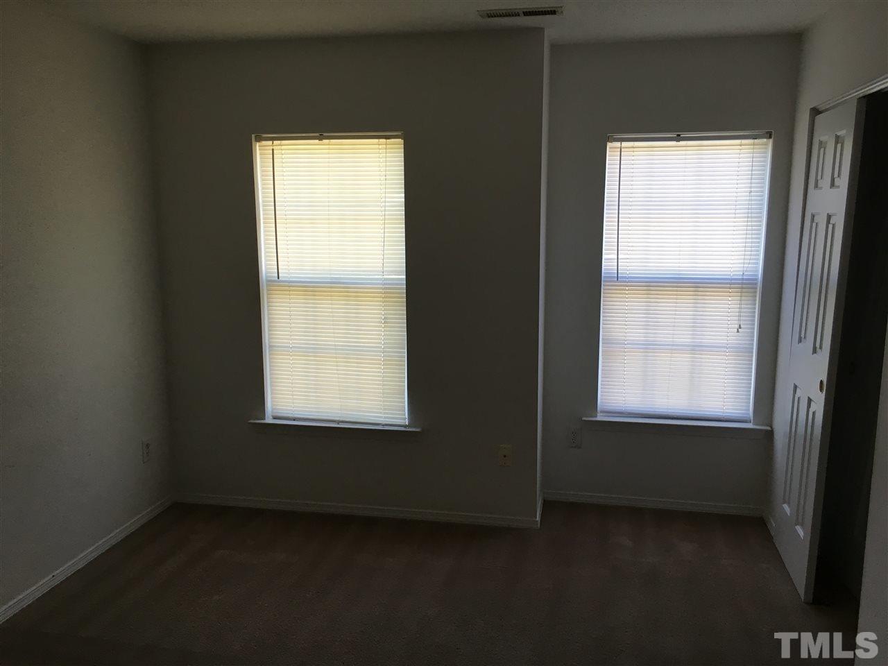4841 Heatherfield Way Raleigh, NC 27604 - Photo 17 of 23 a view of an empty room and a window