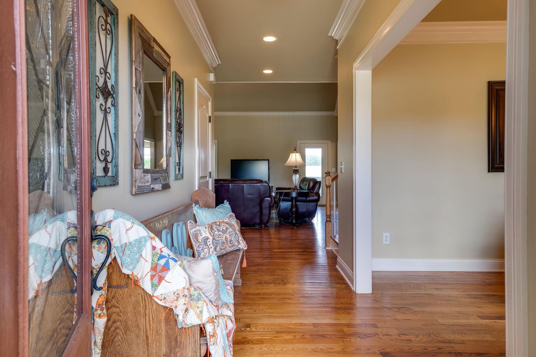 979 Franklin Road Gallatin, TN 37066 - Photo 8 of 24 a living room with furniture and a wooden floor