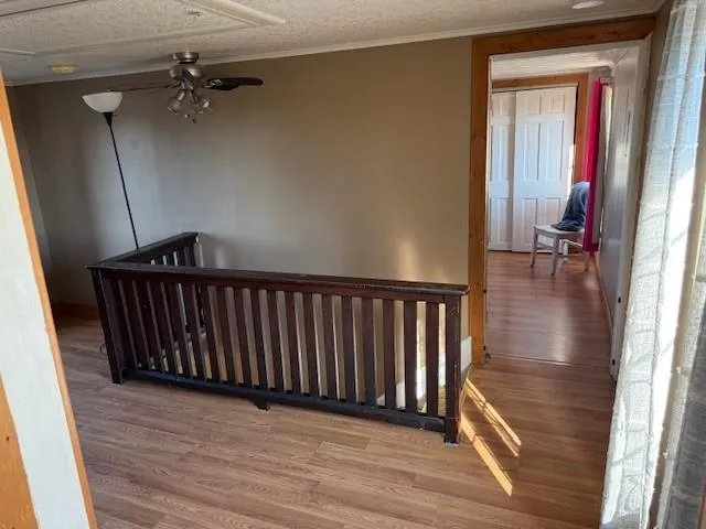 a bedroom with a bed and a mirror