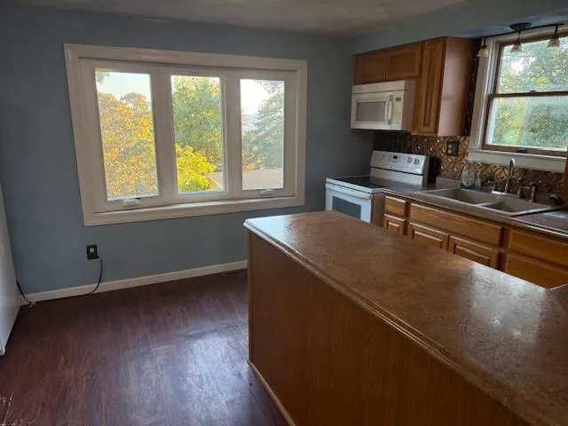 a room with window and bathroom