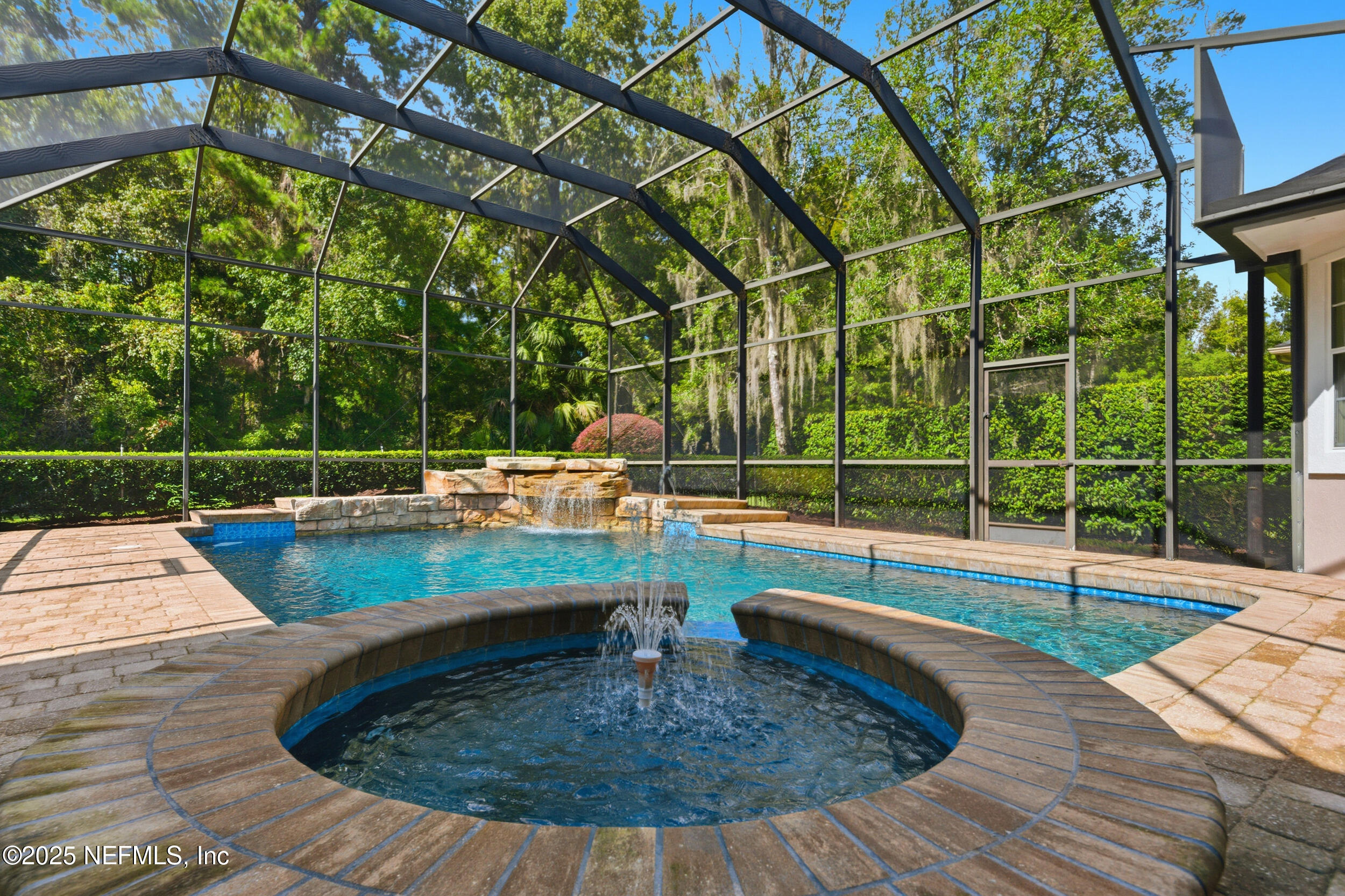 10044 Vineyard Lake Road East Jacksonville, FL 32256 - Photo 28 of 34 a view of a swimming pool with a sitting area