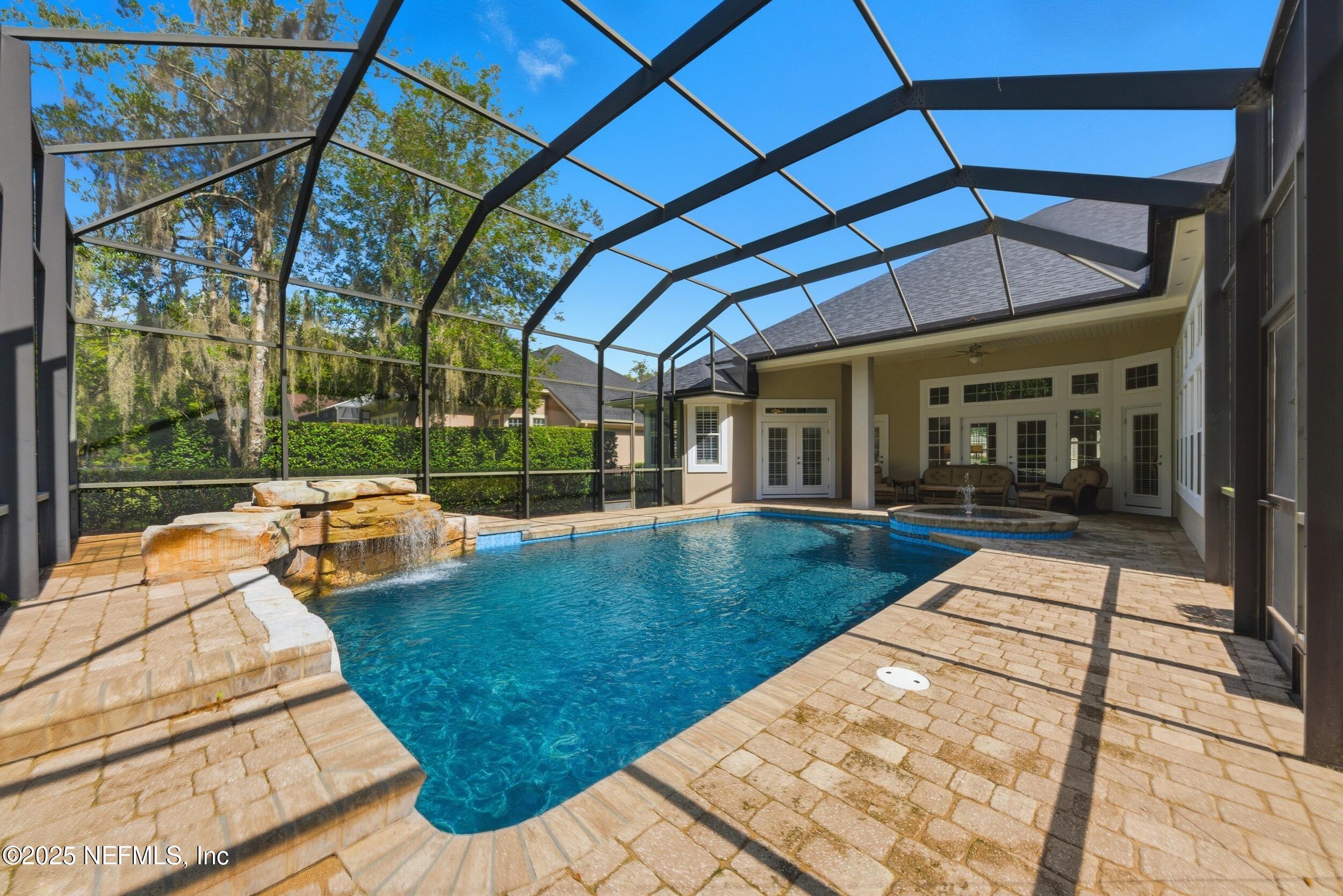 10044 Vineyard Lake Road East Jacksonville, FL 32256 - Photo 29 of 34 a view of a backyard with sitting area