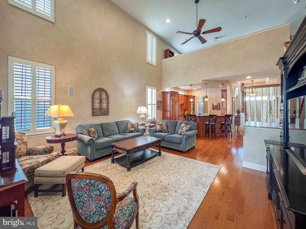 209 Regency Boulevard Yardley, PA 19067 - Photo 11 of 58 a living room with furniture and wooden floor
