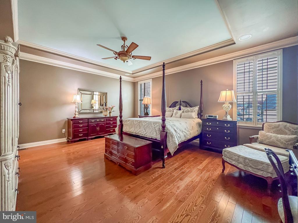 209 Regency Boulevard Yardley, PA 19067 - Photo 16 of 58 a spacious bedroom with two beds and a couch