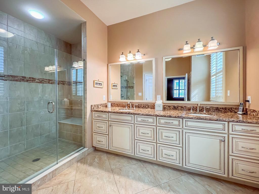 209 Regency Boulevard Yardley, PA 19067 - Photo 18 of 58 a bathroom with a double vanity sink mirror and double