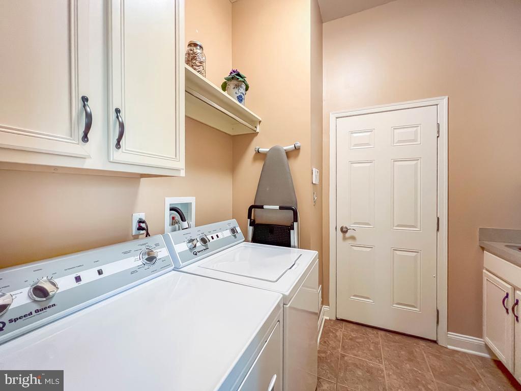 209 Regency Boulevard Yardley, PA 19067 - Photo 25 of 58 a utility room with dryer and washer