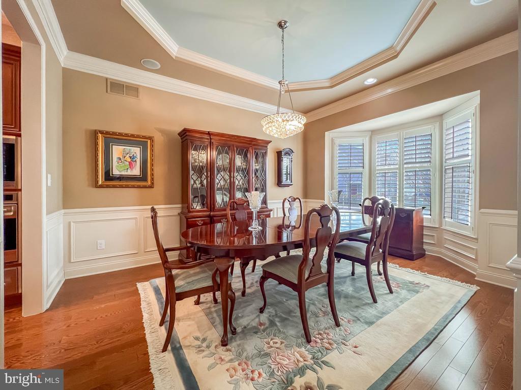 209 Regency Boulevard Yardley, PA 19067 - Photo 5 of 58 a view of a dining room with furniture window and wooden floor