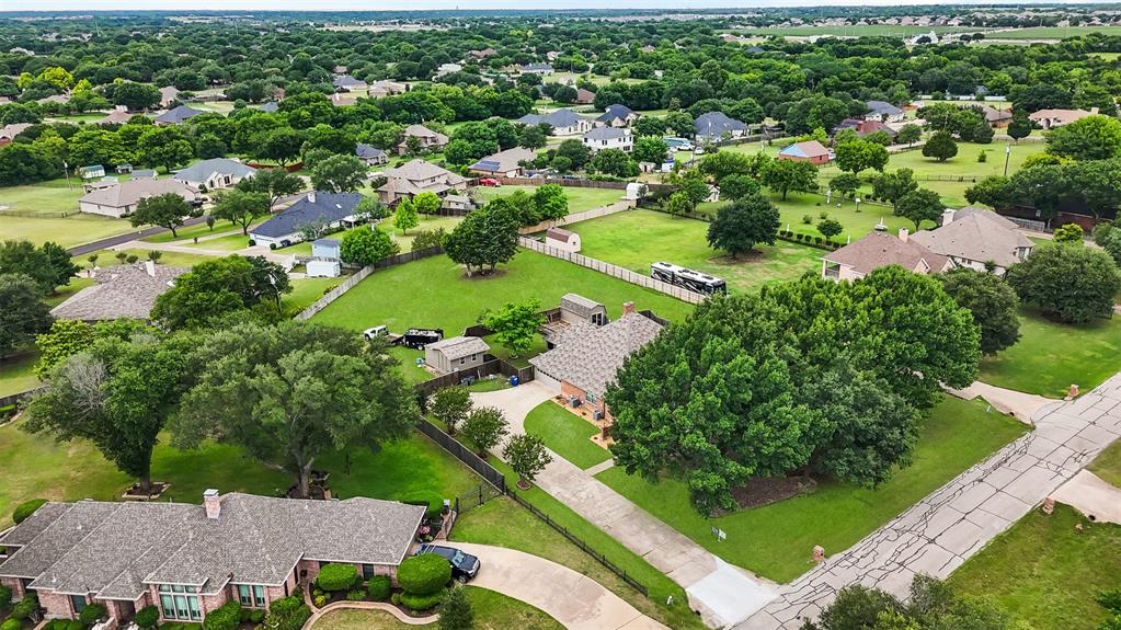909 Valley View Avenue Red Oak, TX 75154 - Photo 35 of 37 an aerial view of residential houses with outdoor space
