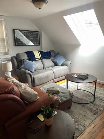 a bedroom with a bed and cabinets