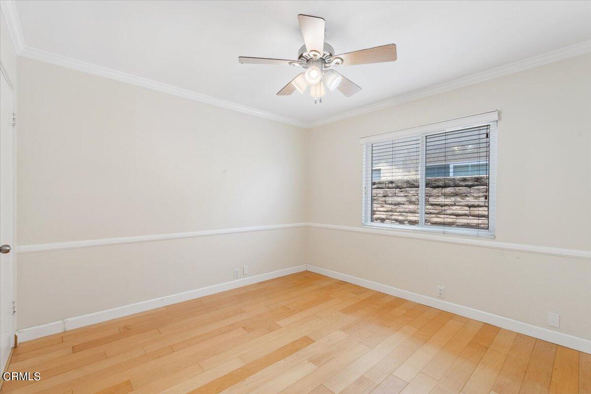111 Bottlebrush Circle Oxnard, CA 93030 - Photo 19 of 44 an empty room with a window and a fan