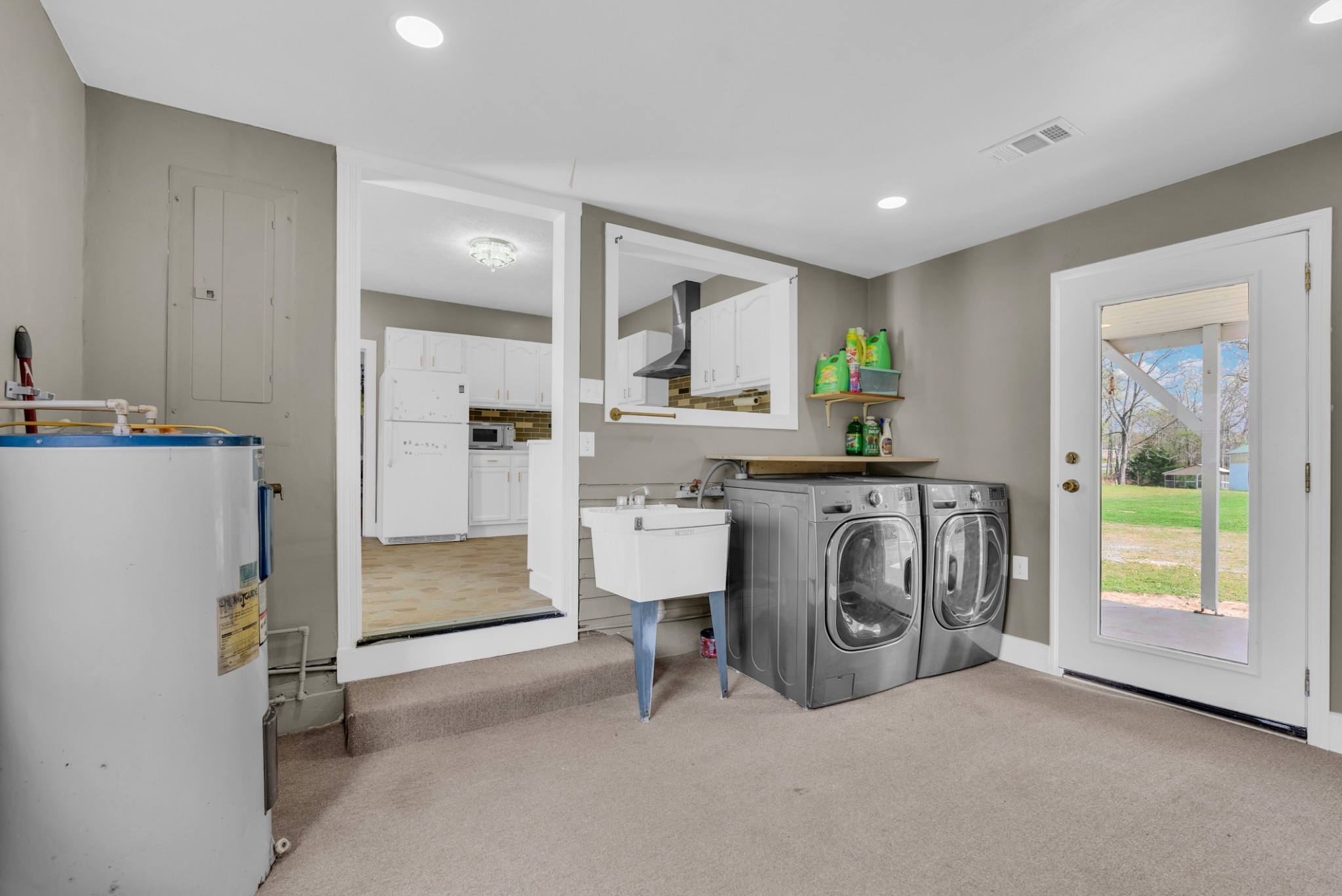 320 West King Street Morrison, TN 37357 - Photo 18 of 29 a kitchen with stainless steel appliances granite countertop a refrigerator and a stove