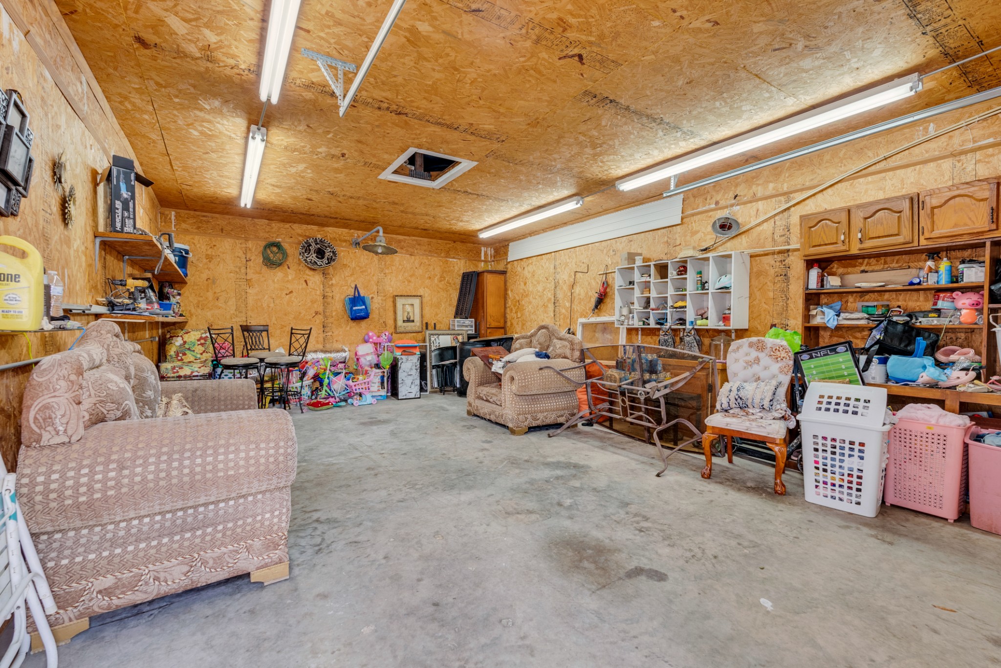 320 West King Street Morrison, TN 37357 - Photo 26 of 29 a living room with lots of furniture and a chandelier