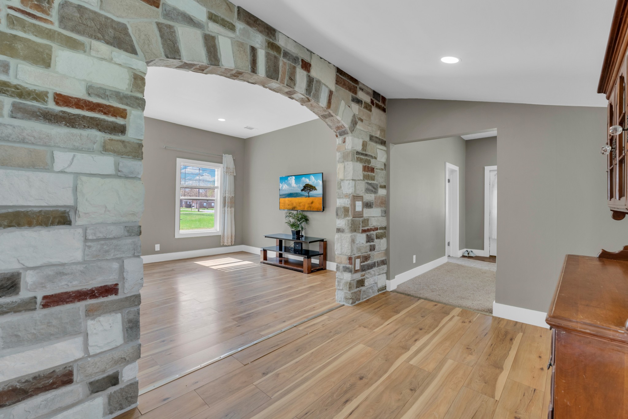 320 West King Street Morrison, TN 37357 - Photo 9 of 29 a view of a hallway with a dining table chairs and couches