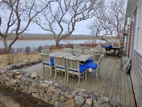 74 Turkeyland Cove Road Edgartown, MA 02539 - Photo 11 of 23 a view of a terrace with furniture