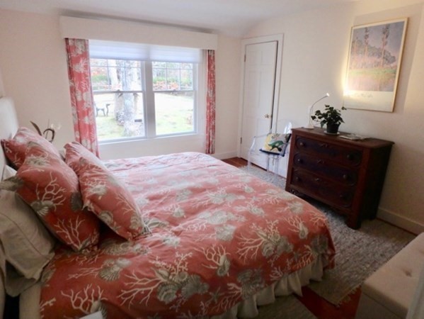 74 Turkeyland Cove Road Edgartown, MA 02539 - Photo 14 of 23 a bedroom with a bed and a window