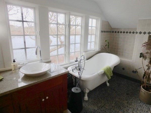 74 Turkeyland Cove Road Edgartown, MA 02539 - Photo 18 of 23 a bathroom with a sink and a bathtub