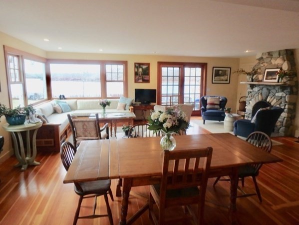 74 Turkeyland Cove Road Edgartown, MA 02539 - Photo 8 of 23 a view of a dining room with furniture window and wooden floor