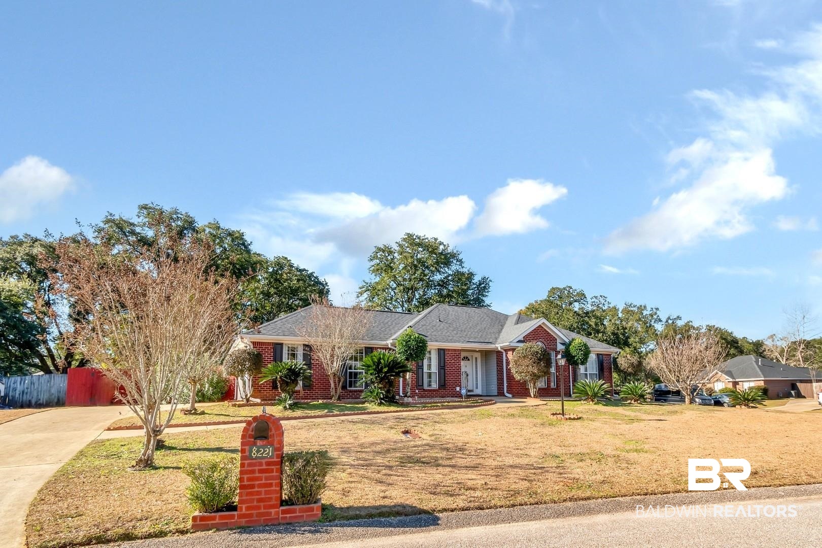 8221 Woodbend Drive Semmes, AL 36575 - Photo 2 of 35 Ranch-style home with a front lawn