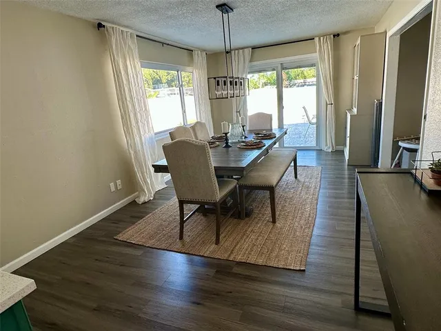 a bathroom with a sink mirror vanity and toilet