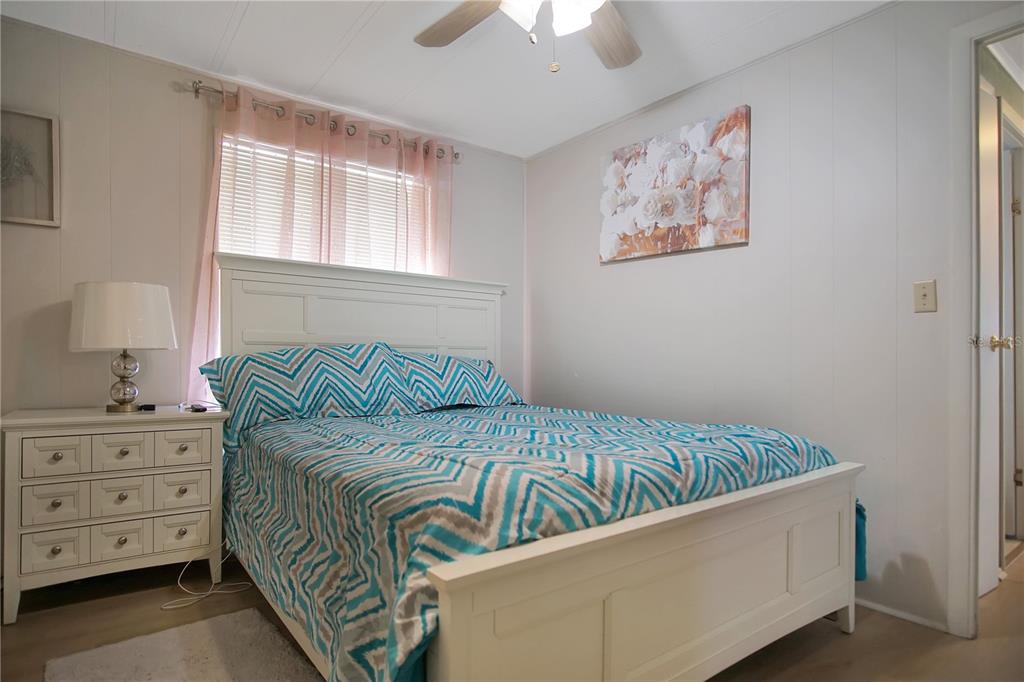 251 Patterson Road, Unit C13 Haines City, FL 33844 - Photo 11 of 28 a bedroom with a bed and a window