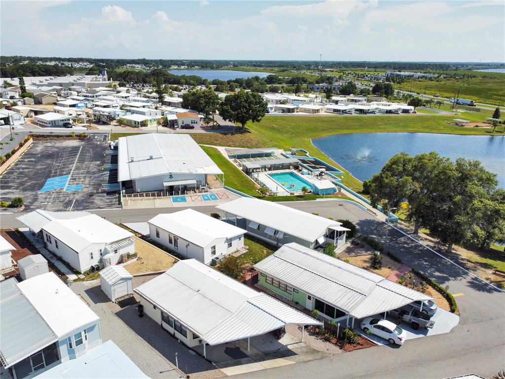 251 Patterson Road, Unit C13 Haines City, FL 33844 - Photo 17 of 28 an aerial view of a city with lawn chairs