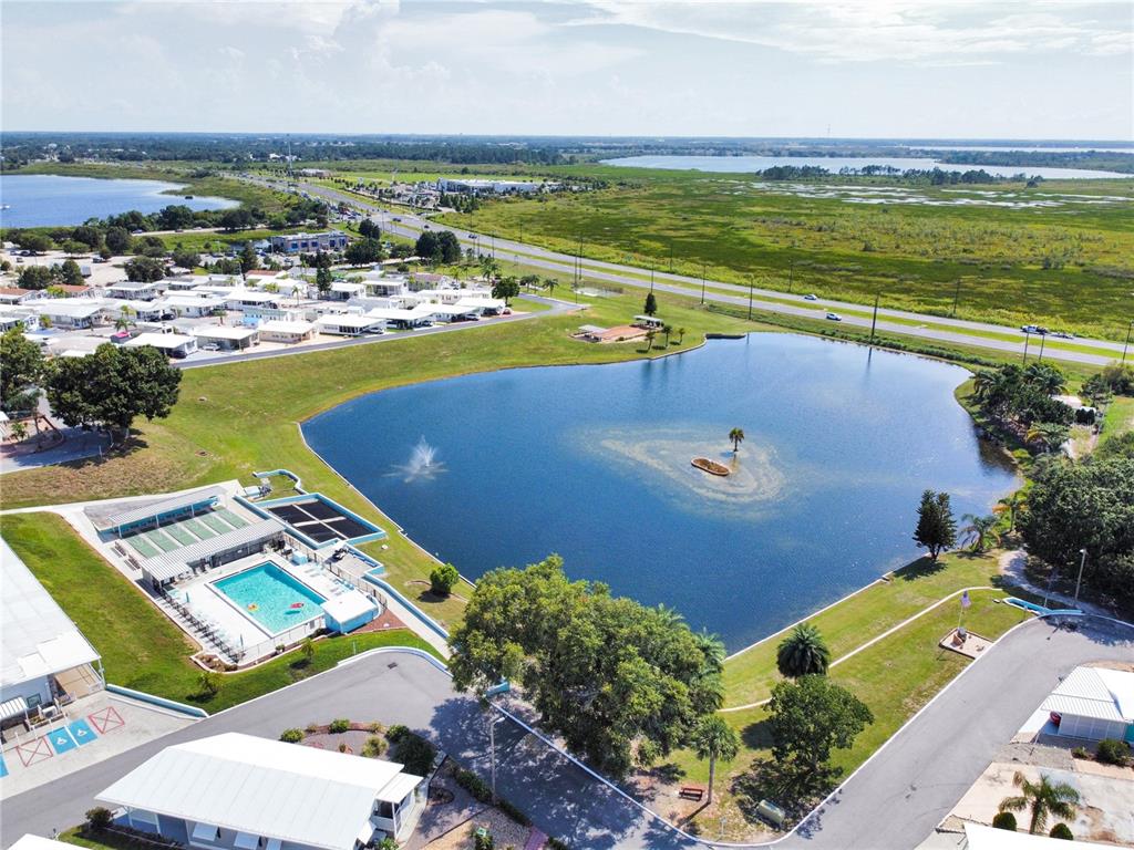 251 Patterson Road, Unit C13 Haines City, FL 33844 - Photo 23 of 28 a view of a city with an ocean view