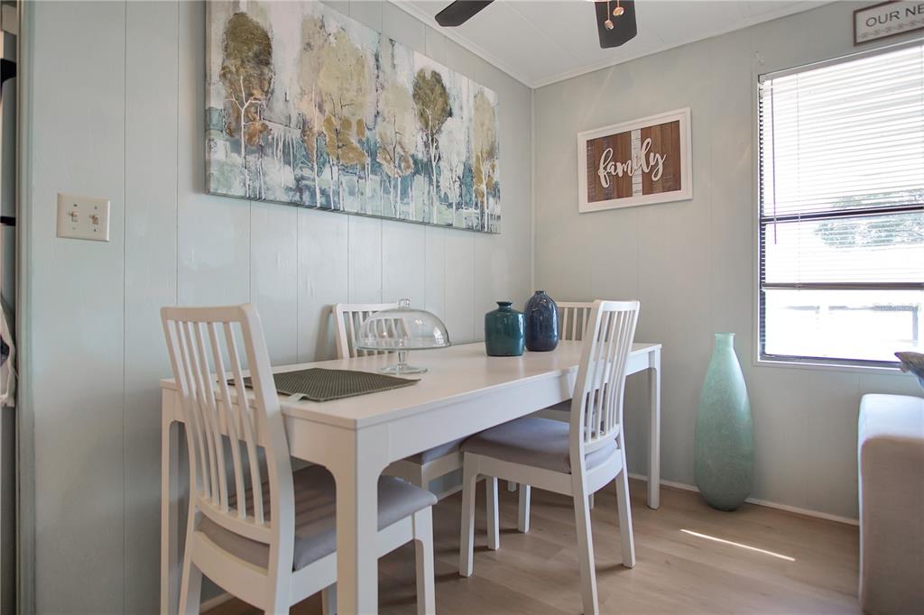 251 Patterson Road, Unit C13 Haines City, FL 33844 - Photo 9 of 28 a view of a dining room that has a table and chair
