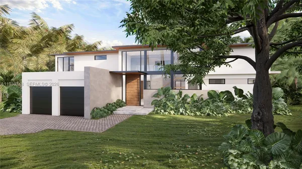 a front view of a house with a garden